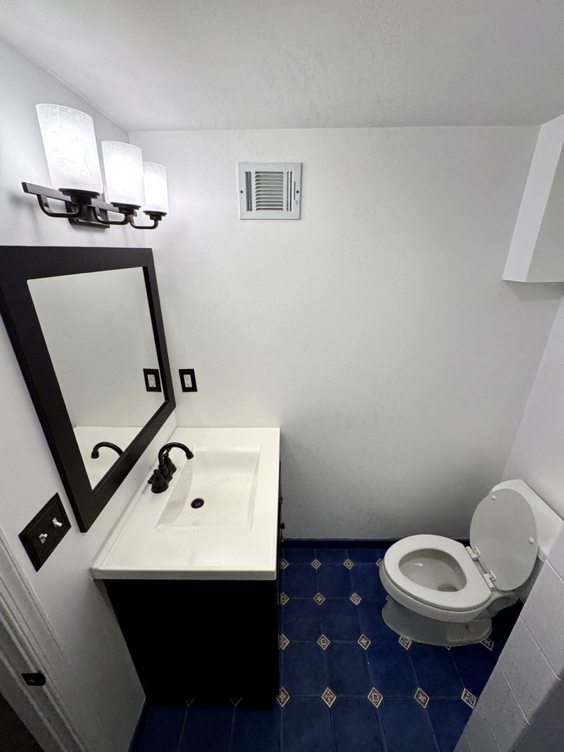 Clean tile shower with mineral-free fixtures after a Capitol Shine deep clean